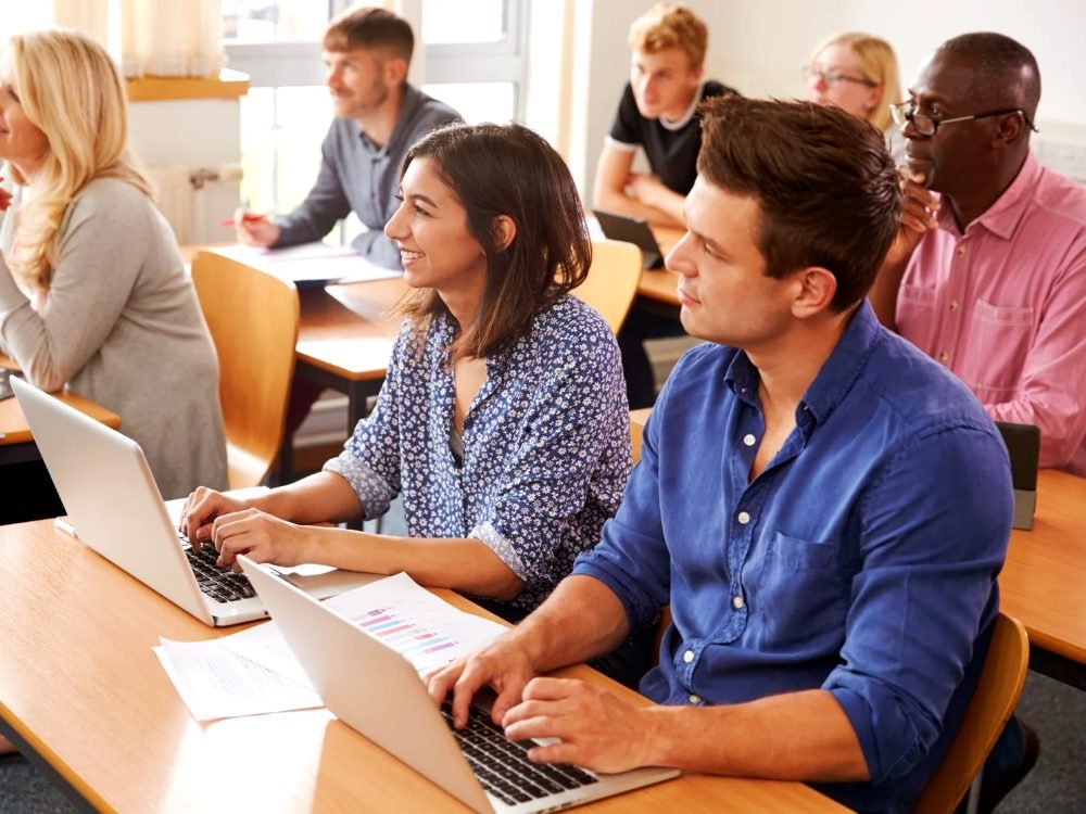 Adults learning together in a classroom