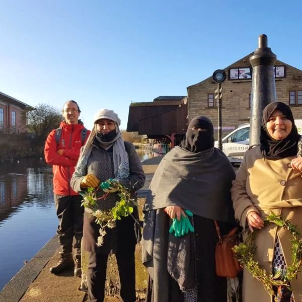 A group out walking by the canal